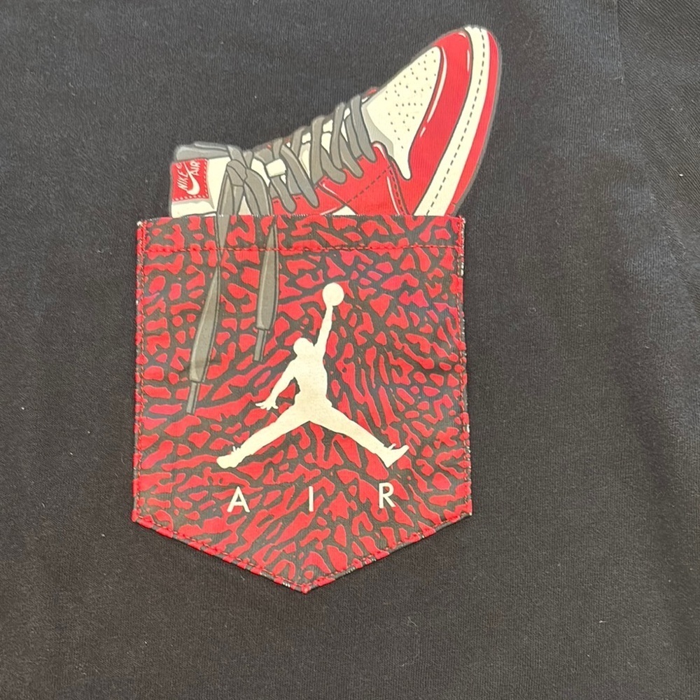 Jordan Black Tee with Red Sneaker Pocket
